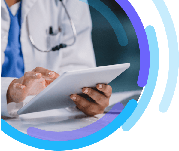 Image of a healthcare professional using a digital tablet in their office