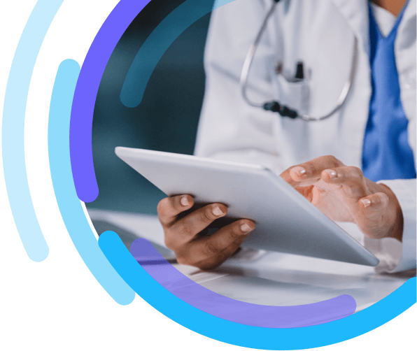 Image of a healthcare professional using a digital tablet in their office