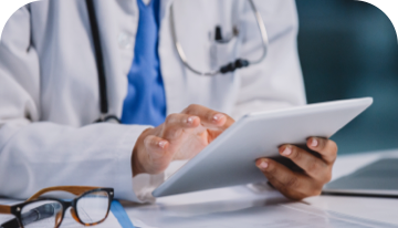 Image of doctor holding a digital tablet