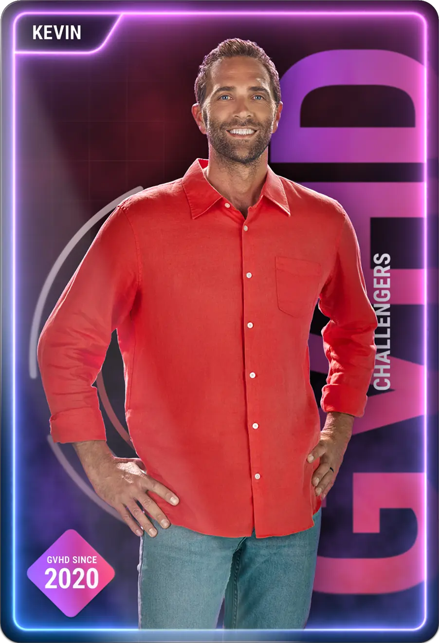 Open patient story: young bearded man in red shirt and jeans smiling with hands on hips.