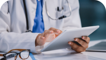 Image of doctor holding a digital tablet